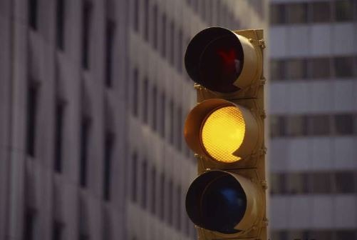 Crossing over yellow light meets accident