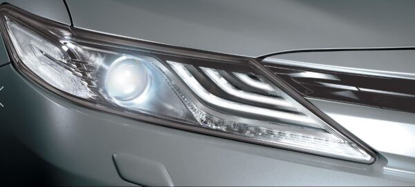 2020 Toyota Camry Hybrid front headlamps close view