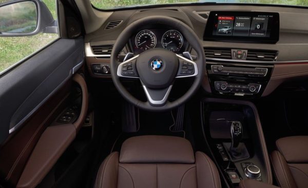 2020 BMW X1 Series infotainment screen steering close view