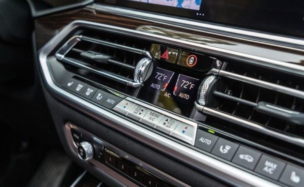 BMW 5 Series xDrive40i air vents and button close view