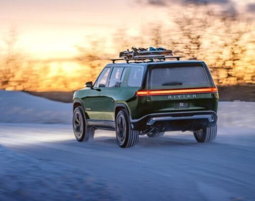 1st Generation Rivian R1S SUV Rear view on the run