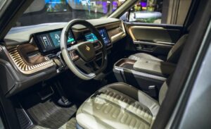 1st Generation Rivian R1T electric pickup truck front cabin interior view