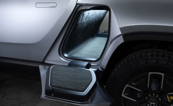 1st Generation Rivian R1T electric pickup truck spare space behind the rear seats