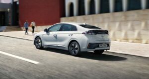 1st Generation Hyundai Ioniq Hybrid sedan side rear view