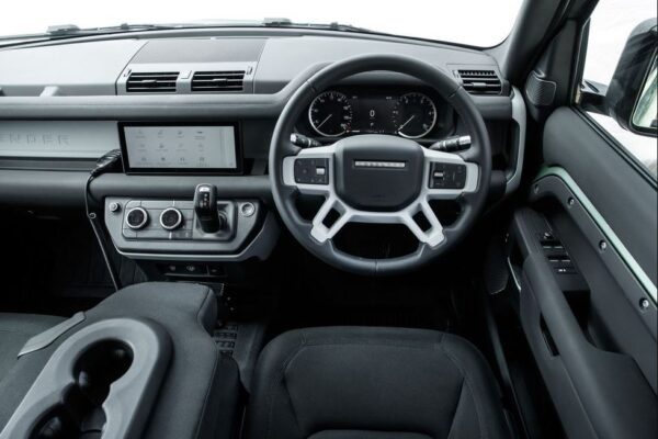 Latest generation Land Rover Defender SUV front cabin interior