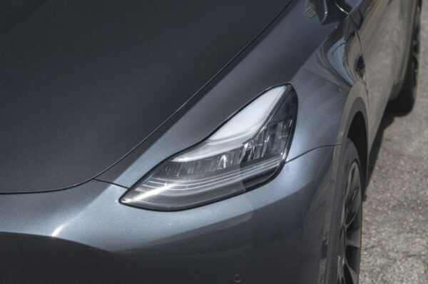 Tesla Model Y Smart SUV headlamps close view