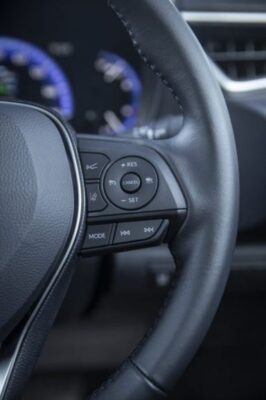 12th Generation Toyota Corolla Hybrid Sedan controls on steering wheel