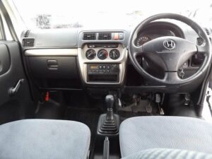 3rd generation Honda acty minivan front dashboard view