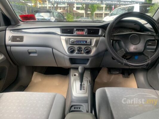 6th generation Mitsubishi Lancer sedan front cabin interior view
