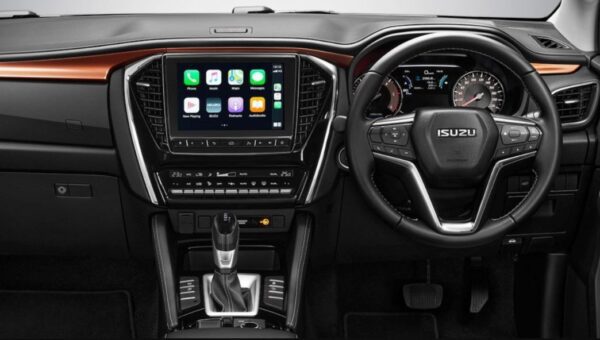 2nd generation Isuzu Mux suv steering wheel and infotainment screen close view