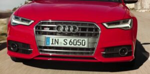 4th generation Audi A6 S6 sedan red front grille close view