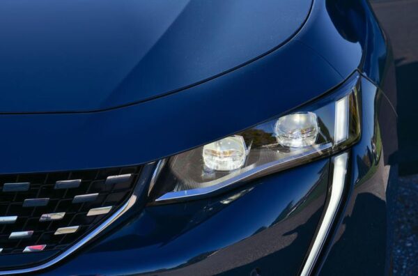 2nd generation peugeot 508 sedan headlamps close view