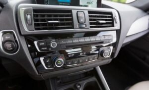 BMW 2 Series Coupe First Generation front air vents and controls