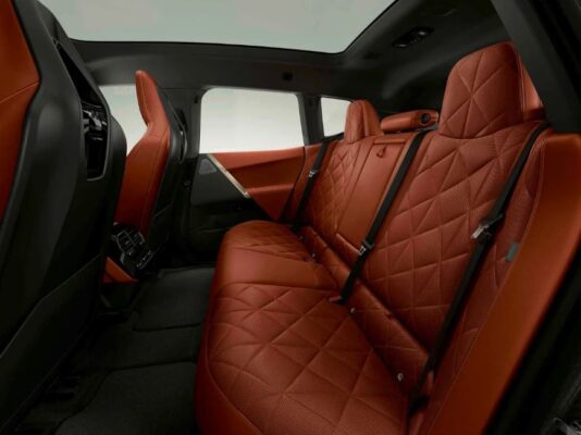 BMW IX Mid Size SUV 1st Generation Brown Interior rear seats