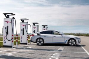 BMW i4 EV 1st generation sedan another full beautiful side view