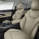 BMW i4 EV 1st generation sedan front seats view