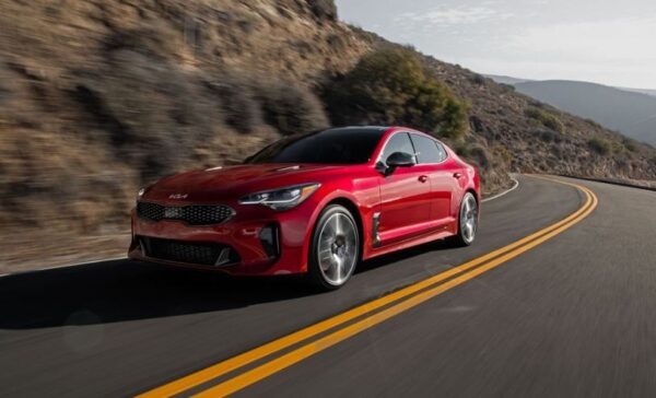Kia stinger sedan Refreshed 1st generation red on the run view
