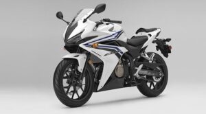 honda cbr 500r heavy bike white front and side view