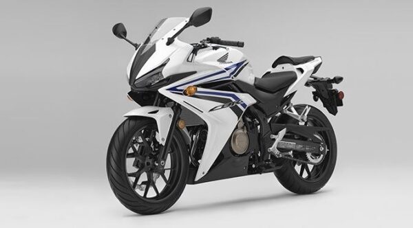 honda cbr 500r heavy bike white front and side view