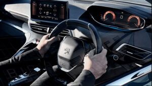 Peugeot 3008 SUV 2nd generation facelifted cockpit and steering wheel view
