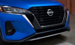 Nissan Kicks SUV 1st generation facelifted grille and headlamp close view