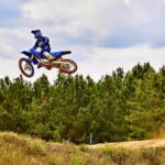 Yamaha YZ125 Motocross Motorcycle flying in the air