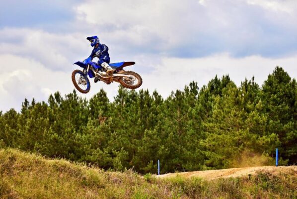 Yamaha YZ125 Motocross Motorcycle flying in the air