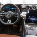 mercedes benz C Class Sedan 5th generation steering wheel and infotainment screen view