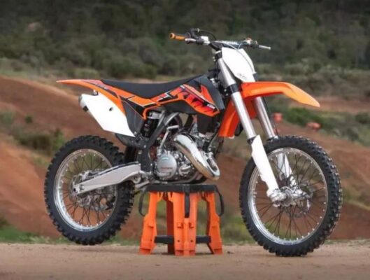 ktm 125 SX off road sports motorcycle front and side view