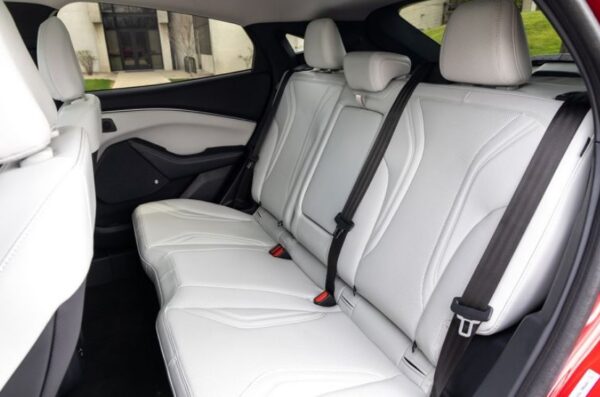 ford Mustang Mach e compact crossover 1st gen full rear seats view