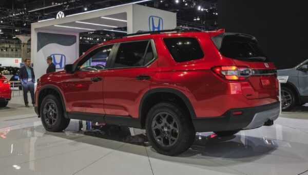 Honda Pilot SUV 4th Generation side and rear view in red color