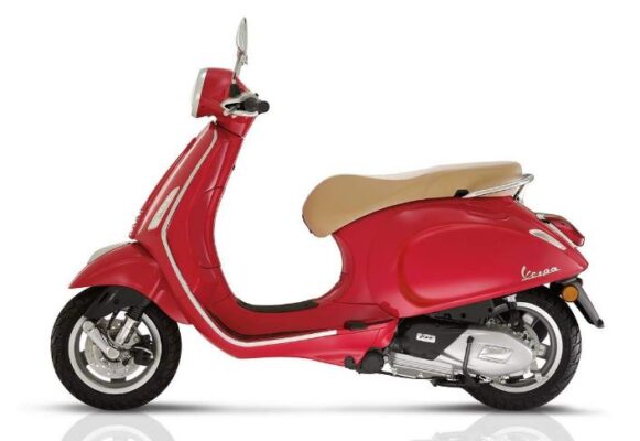 Vespa Primavera 150cc scooter red color side view 2