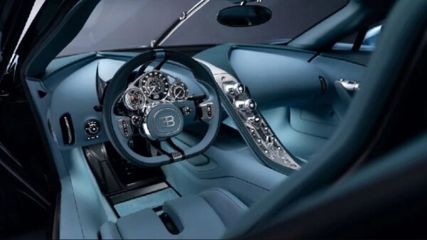 Luxurious interior of the Bugatti Tourbillon featuring a minimalist dashboard