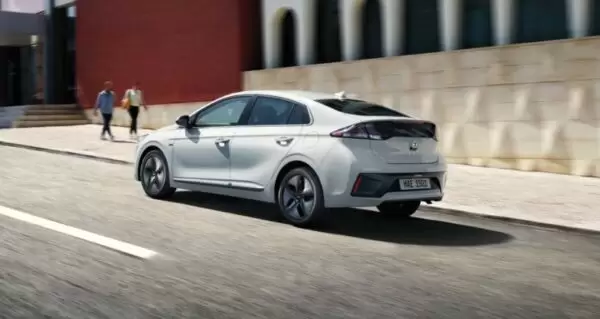 1st Generation Hyundai Ioniq Hybrid sedan side rear view
