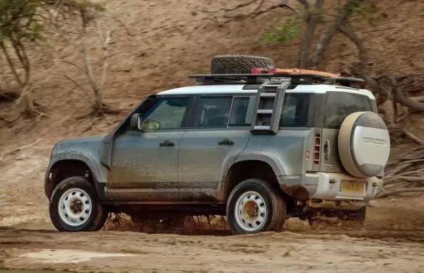 Latest generation Land Rover Defender SUV side Rear view