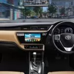 11th generation Toyota corolla Altis Grande sedan front cabin interior view