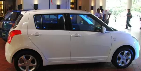 1st generation suzuki swift hatchback side view