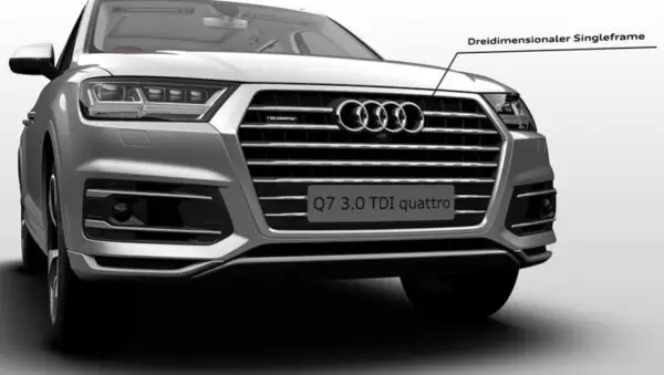 2nd Generation audi Q7 SUV headlamps and grille close view