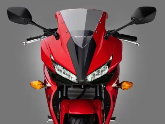 honda cbr 500r heavy bike front headlamps view