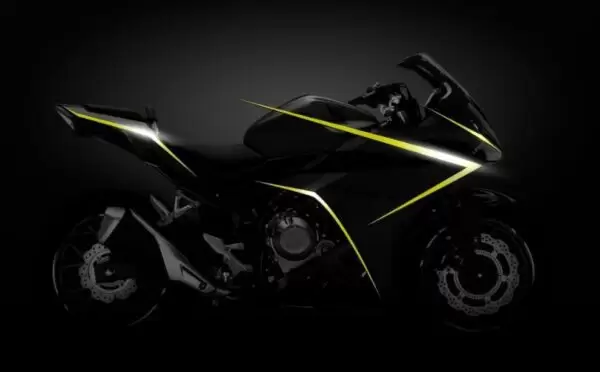 honda cbr 500r heavy bike shinning in dark